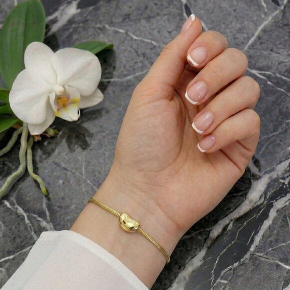 18K Gold Plated Stainless Steel Adjustable Bracelet With Smooth Bean Charm - Picture 3 of 9